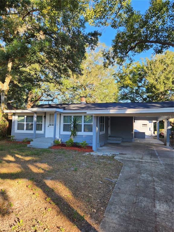 front view of a house with a yard