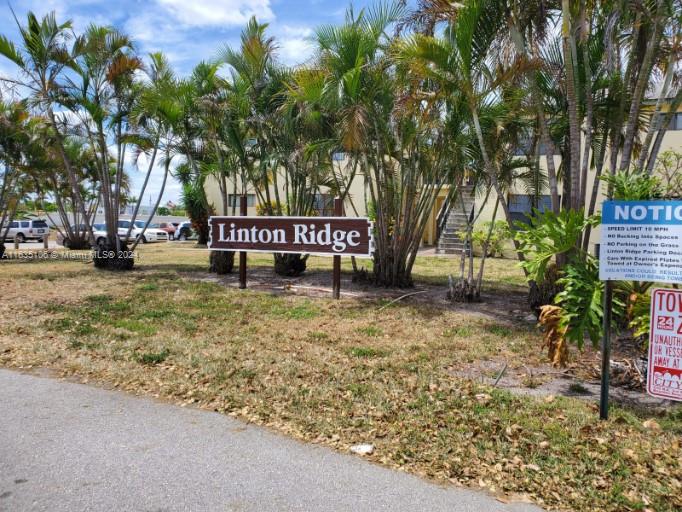 a view of park with sign board