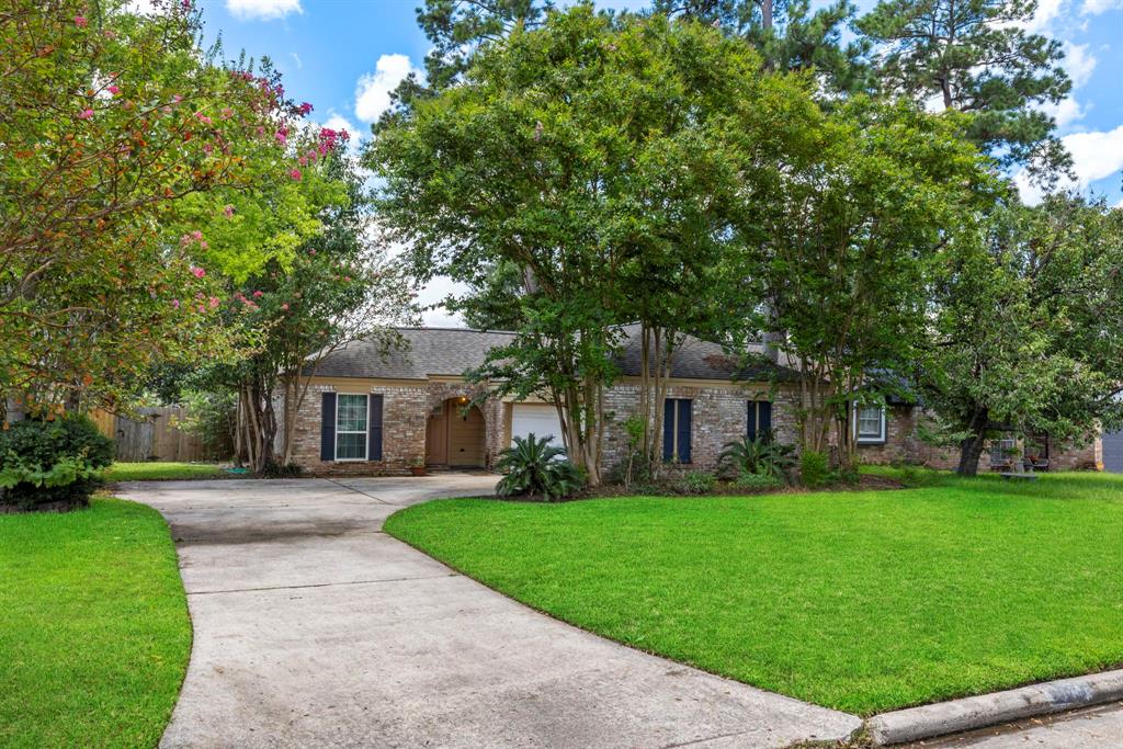 Welcome Home!  Nice size lot with a long driveway and lots of shade.