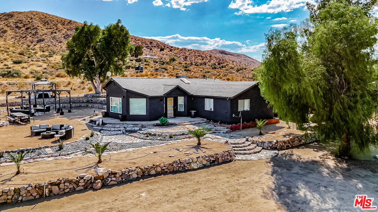 a view of a house with a patio