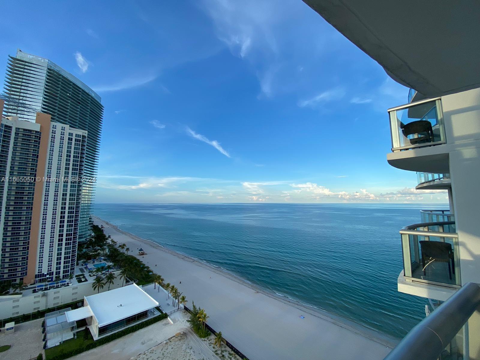 a view of an ocean from a balcony