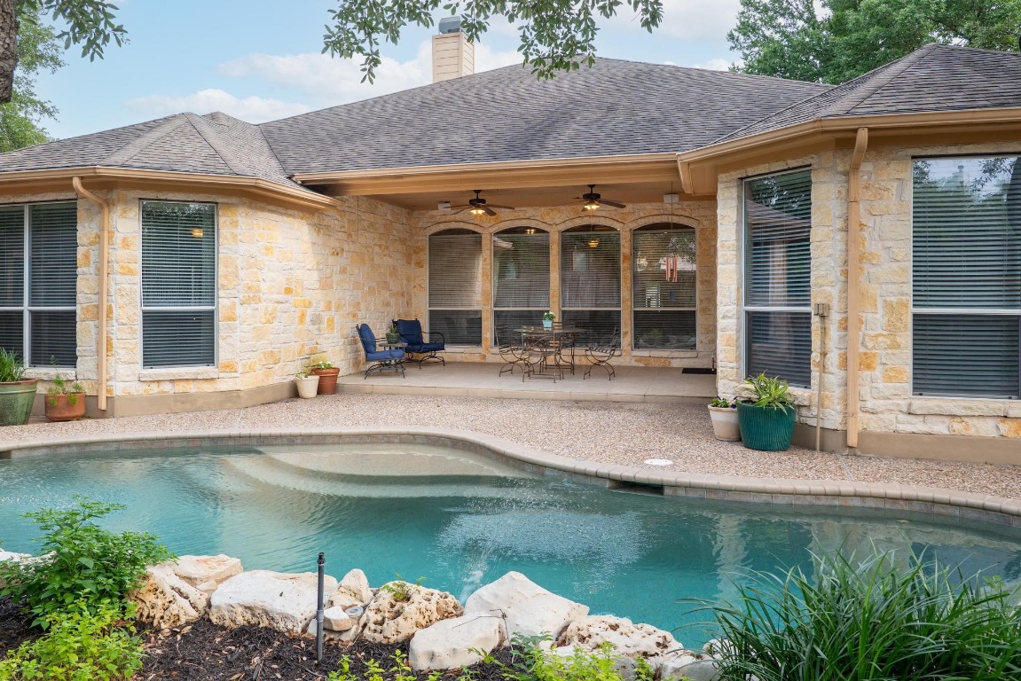 front view of a house with a swimming pool