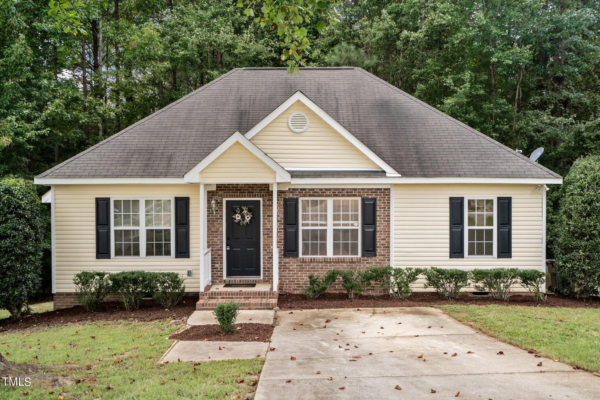 front view of house with a yard