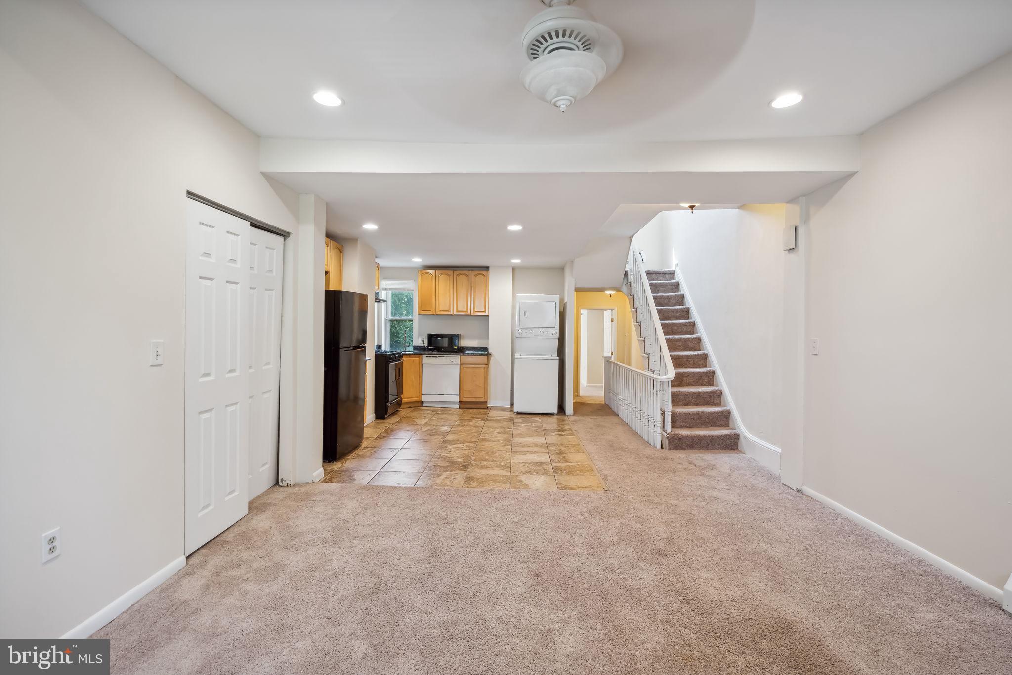 a view of a hallway with stairs