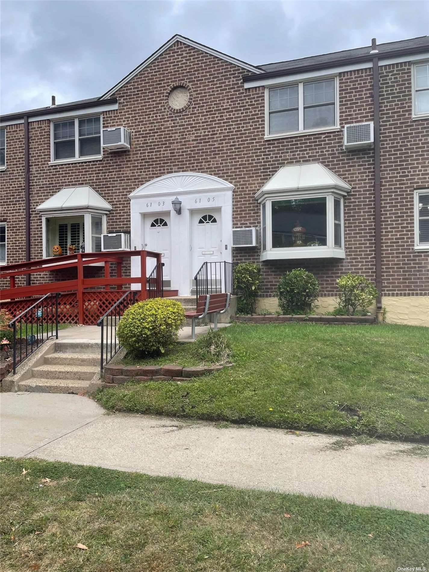 a front view of house with a yard