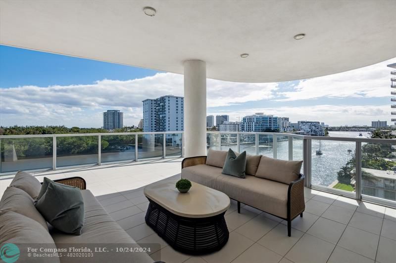 a outdoor living space with furniture and garden view