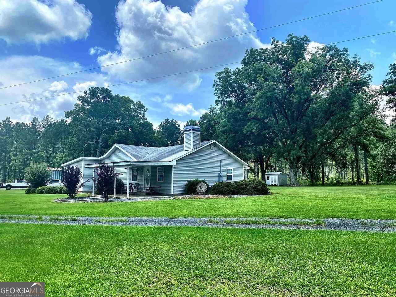 a view of a house with garden