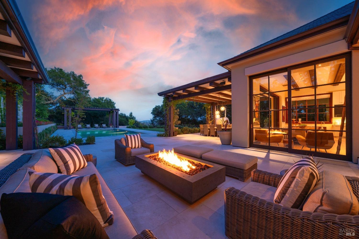 This stunning property features an elegant outdoor living space perfect for relaxation and entertainment.