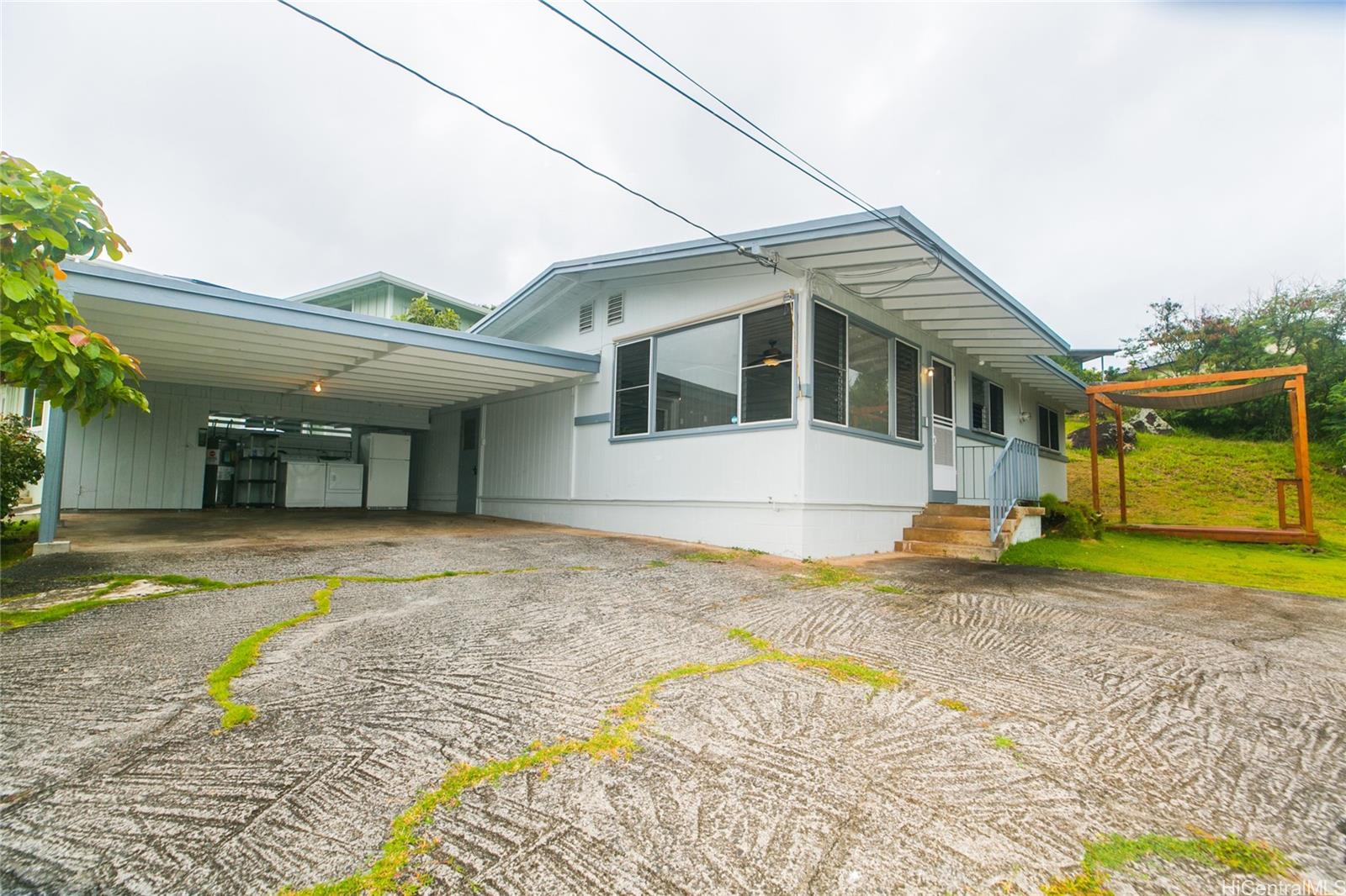 a view of a house with a swimming pool