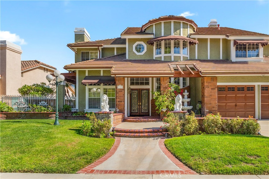 front view of a house with a yard