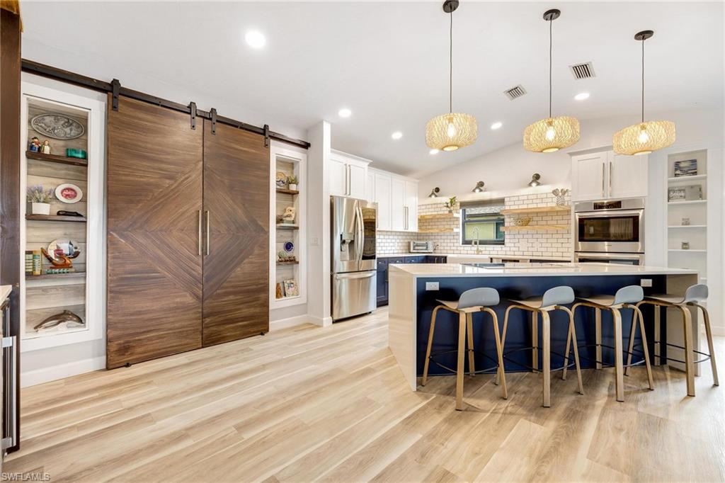 Kitchen island with hidden pantry