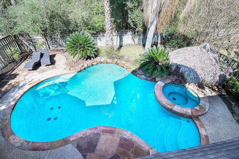 an aerial view of a swimming pool