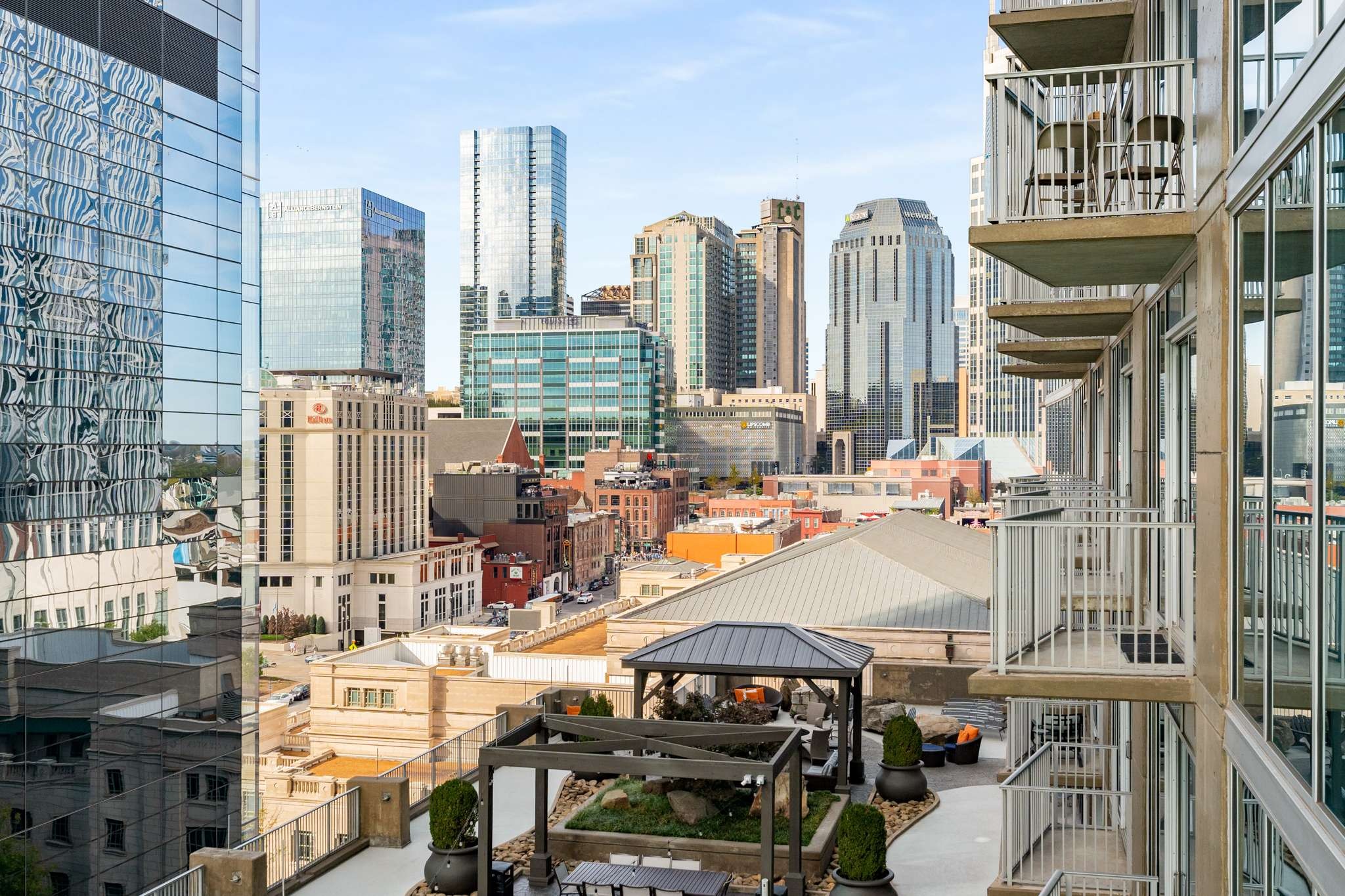 The balcony opens off the living room and provides twinkling downtown views