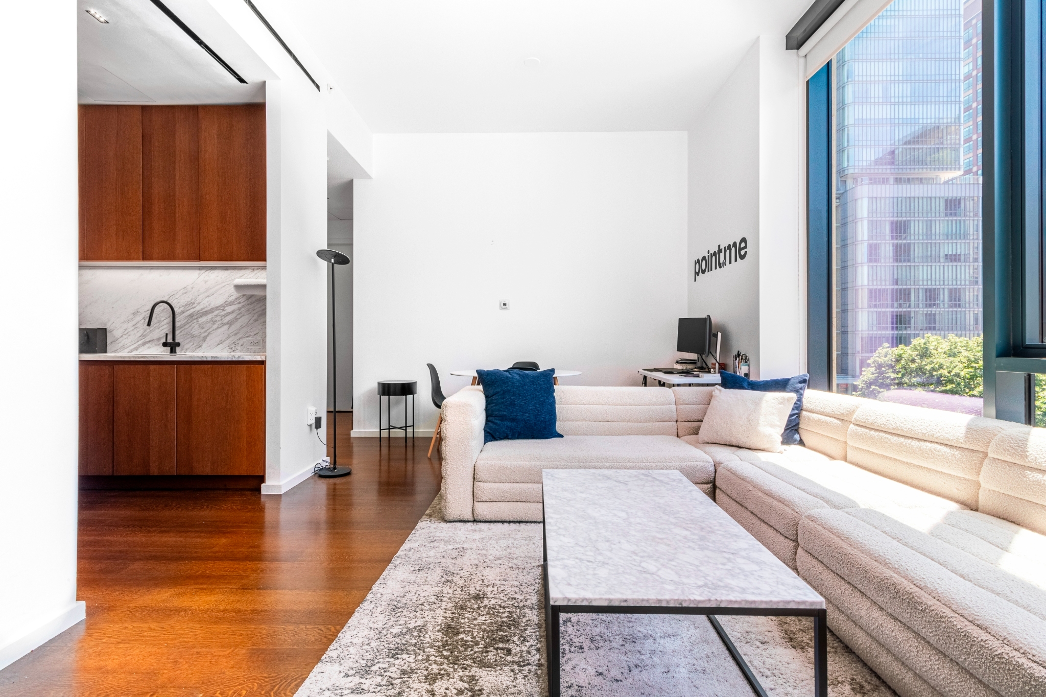 a living room with furniture and a table