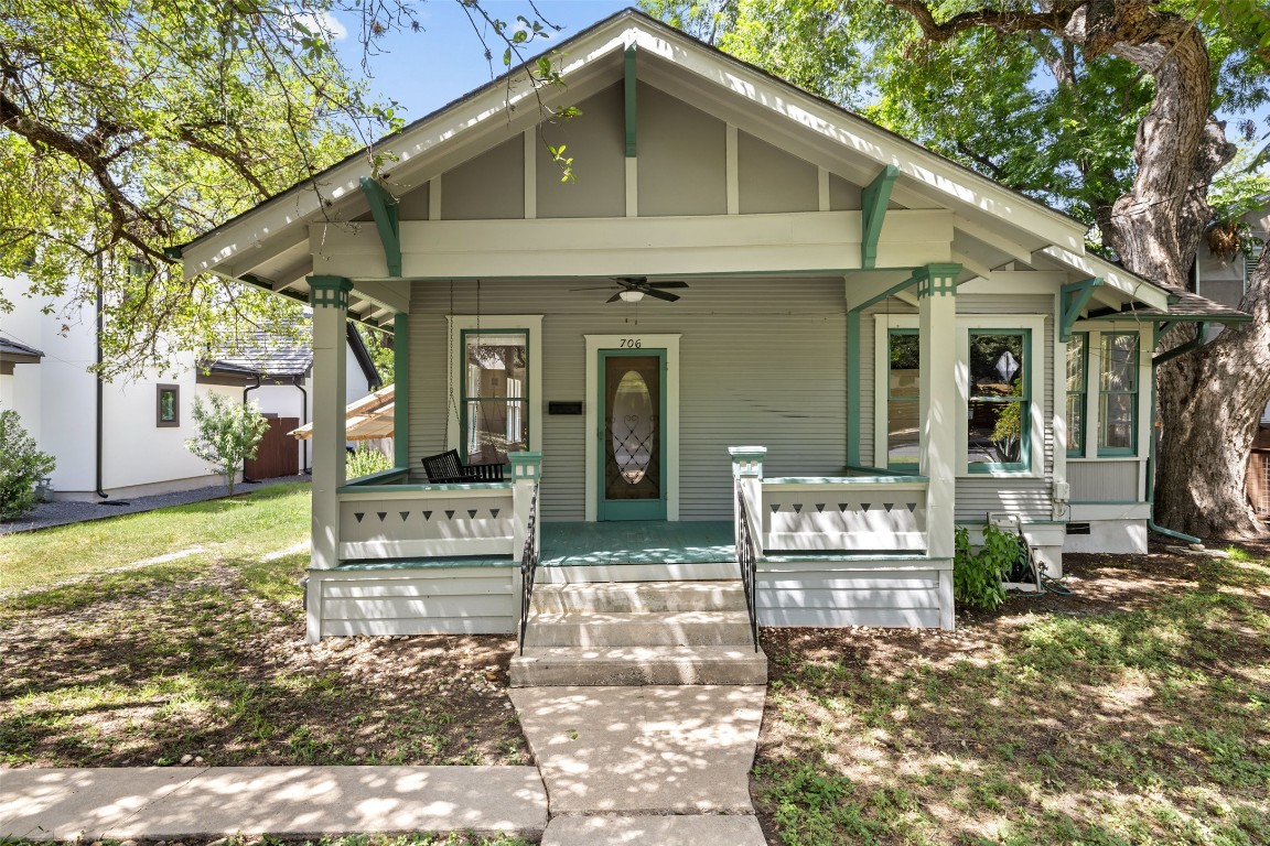 a view of house with backyard space