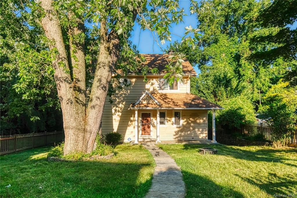 Front yard with magnificent silver maple