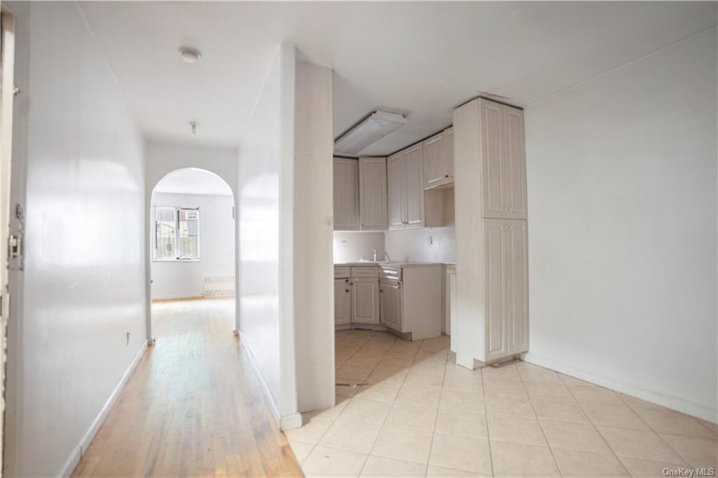 Kitchen featuring light hardwood / wood-style floors and sink