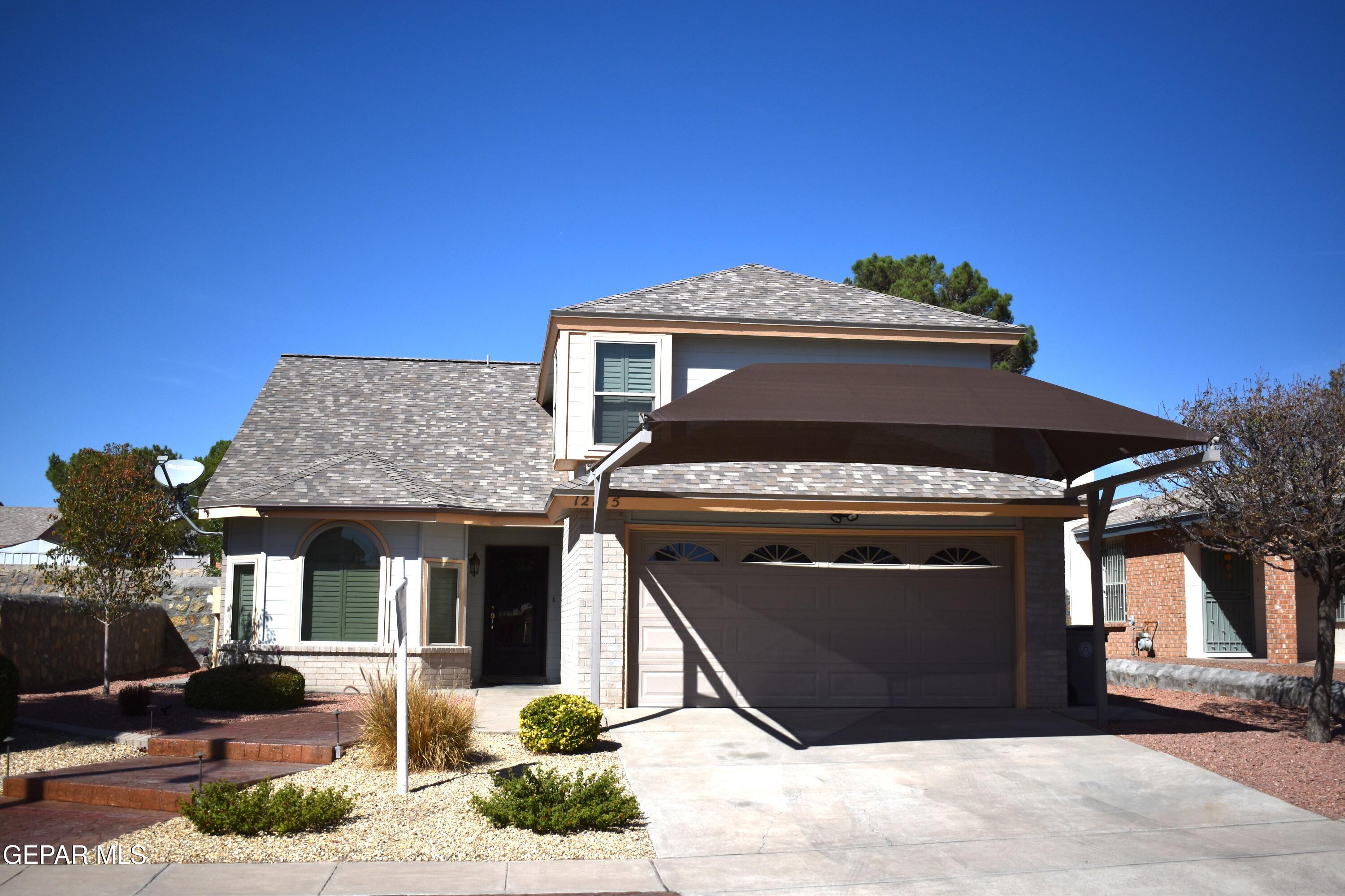 a front view of a house with a space