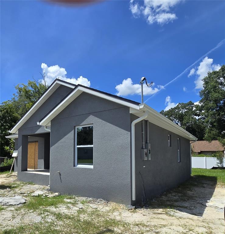 a house with yard in front of it