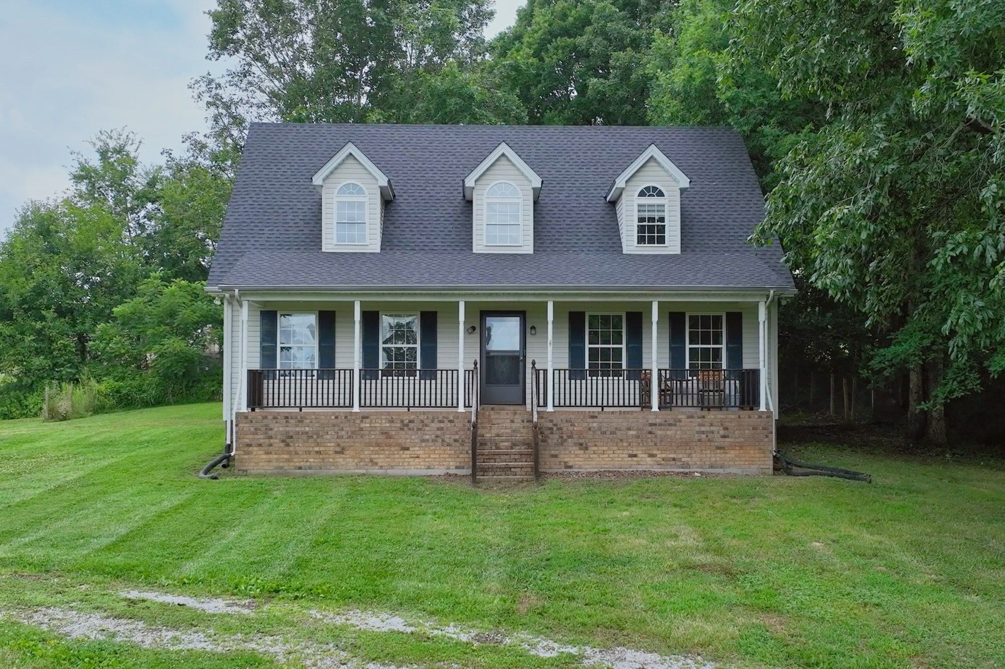 Welcome Home to 223 Lauren Ln!  Nice, two-story Country home with rocking chair front porch!