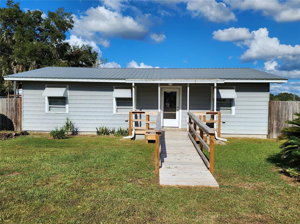 a front view of a house with patio