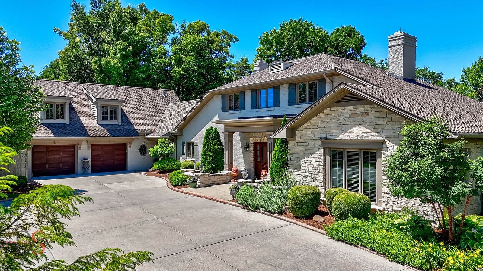 front view of a house with a yard