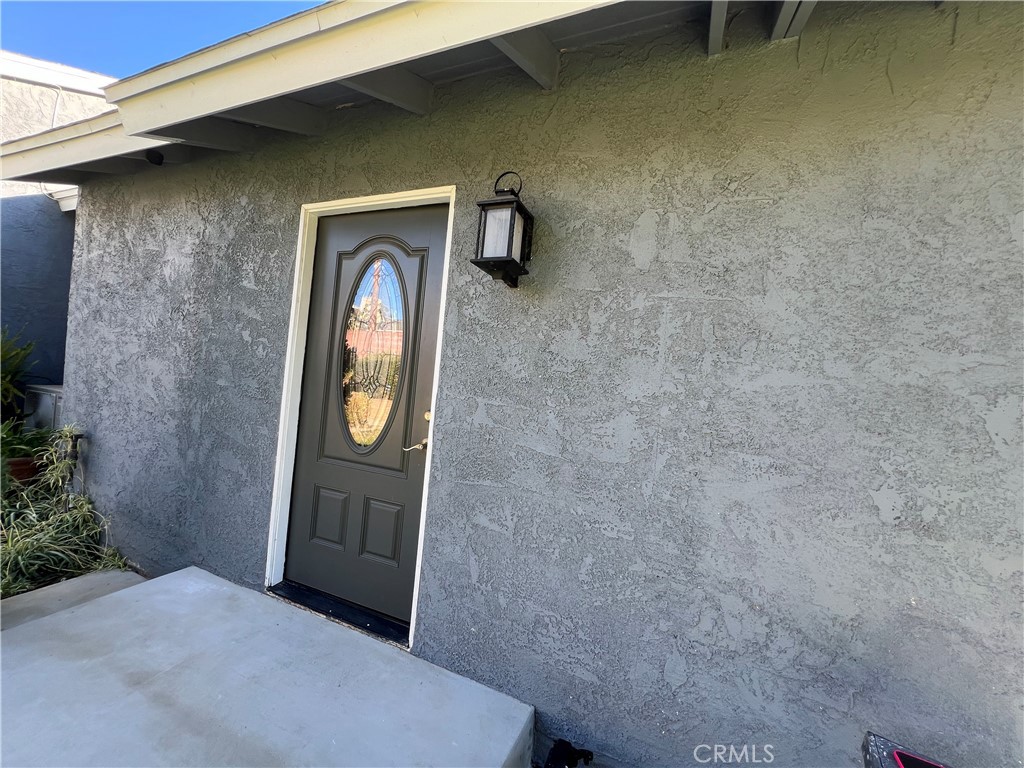 a view of a door of a house with a door