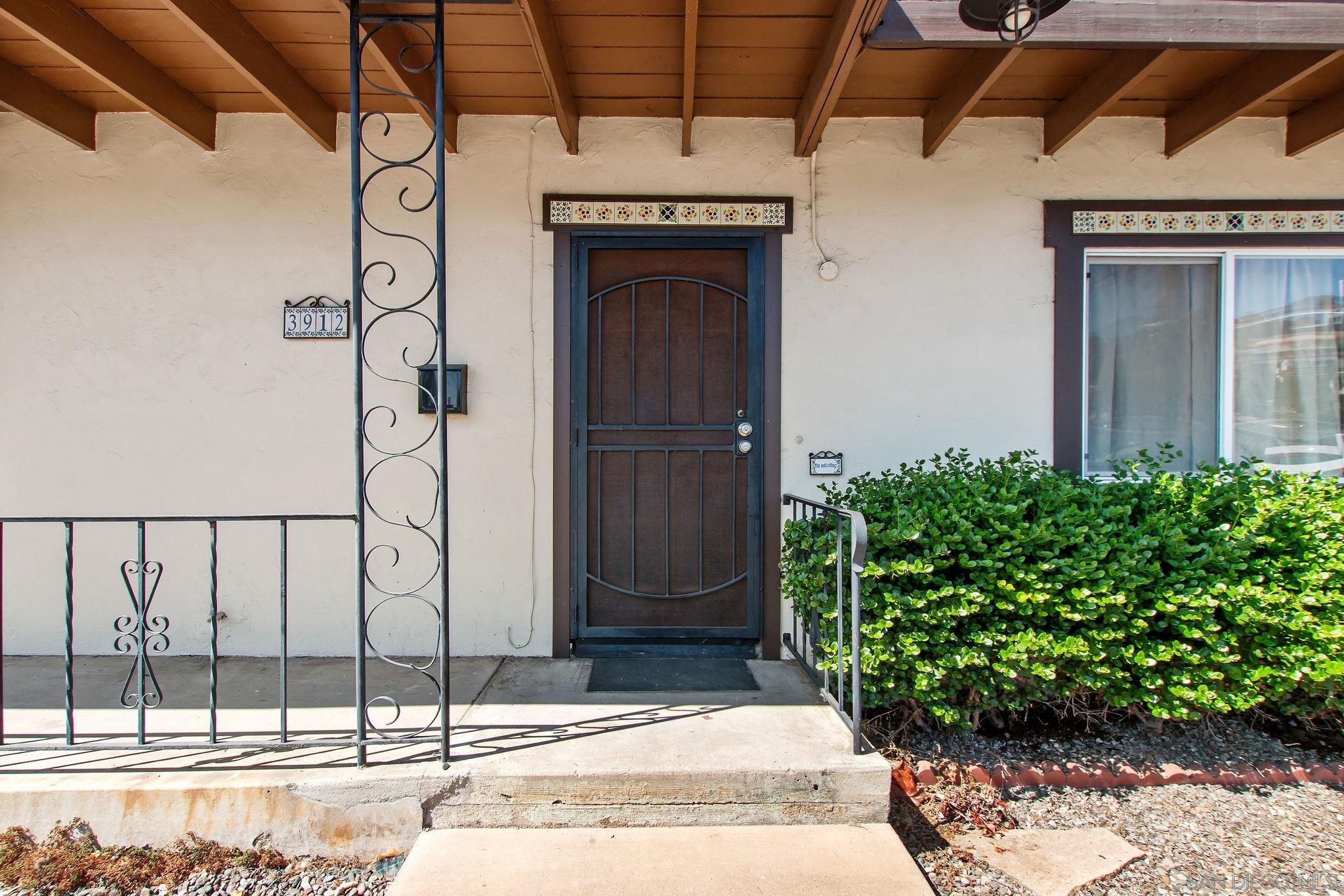 a view of entrance gate of the house