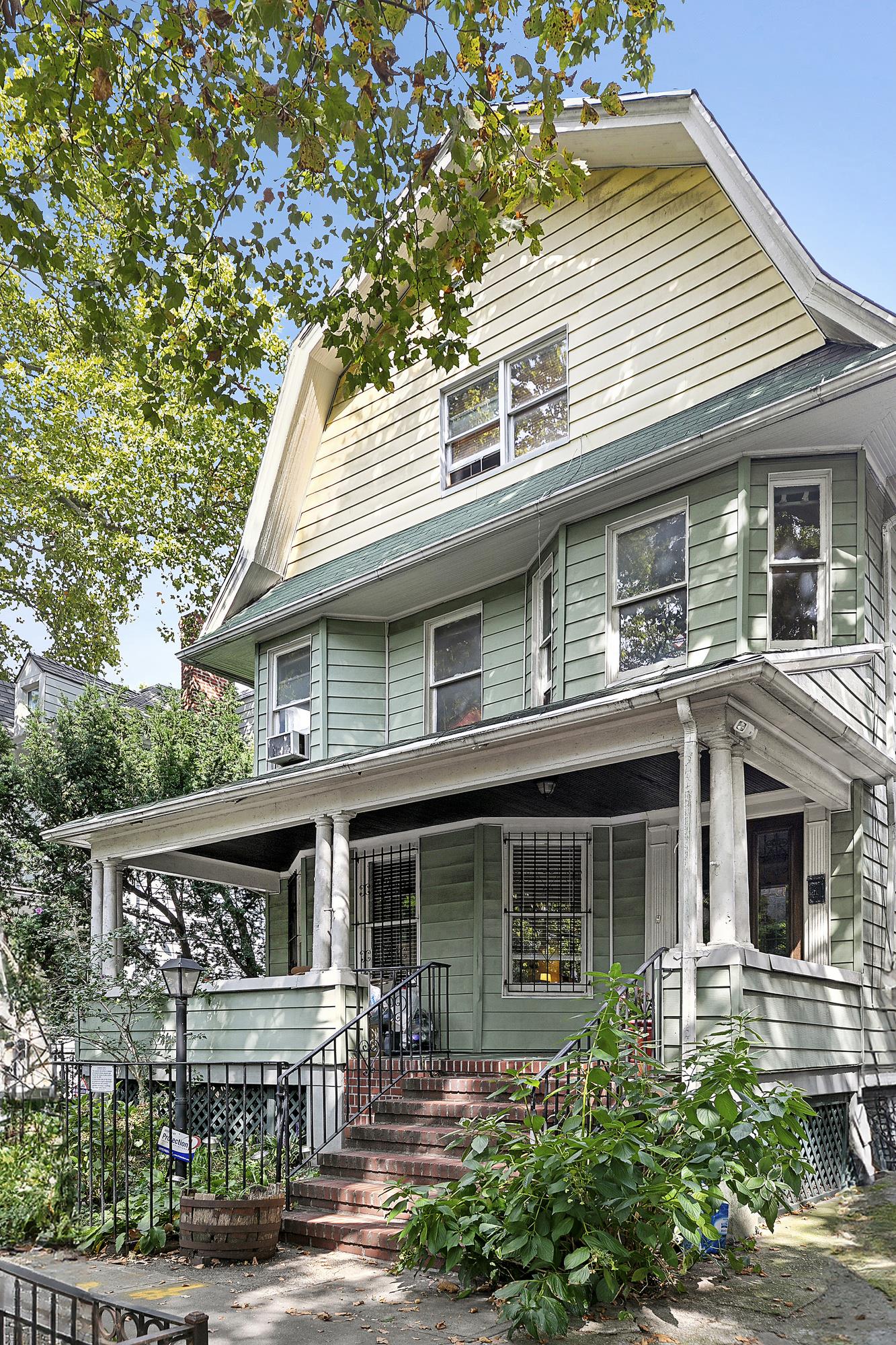 a front view of a house with yard