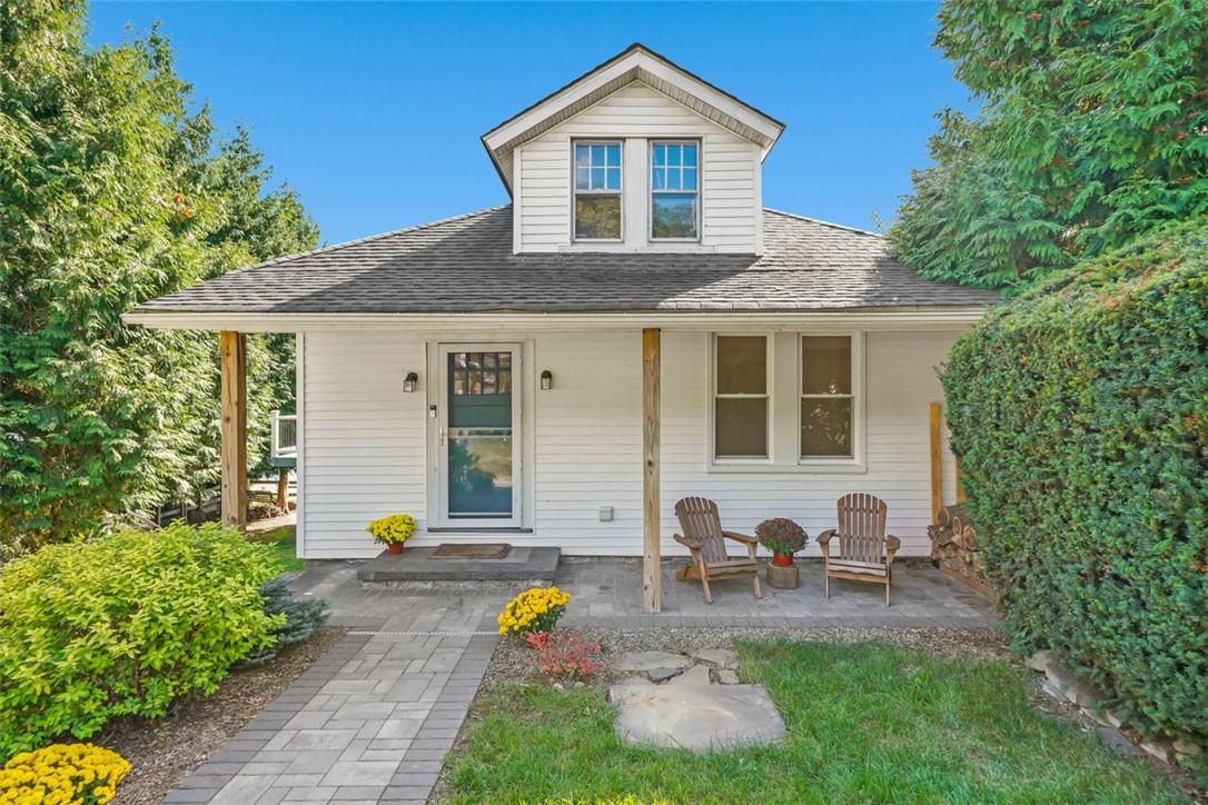 a front view of a house with patio