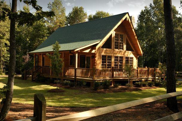 a view of house with swimming pool and a yard