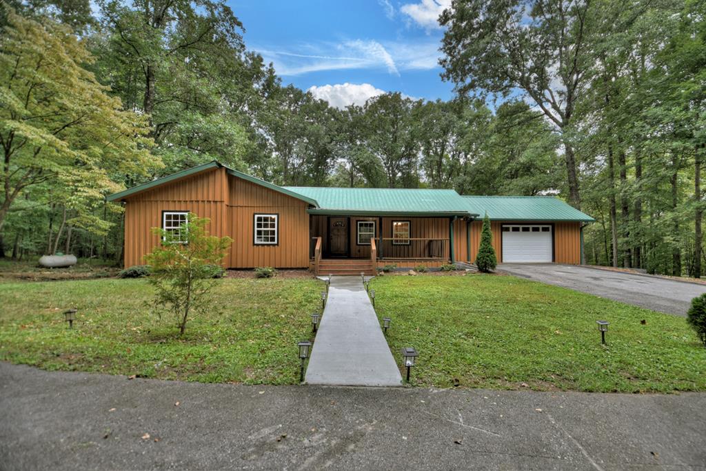 a view of outdoor space yard and front view of a house