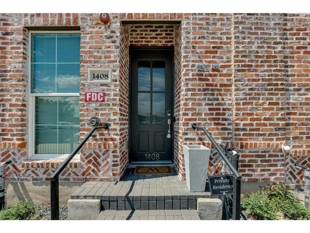 a view of entryway with a wooden door