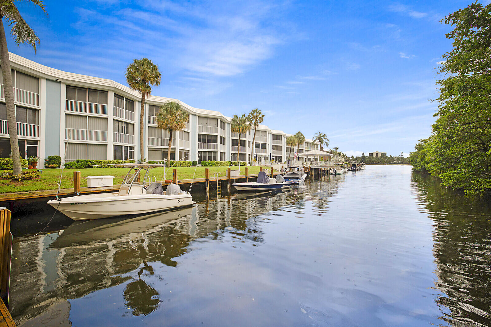 a view of a lake with building in front of it