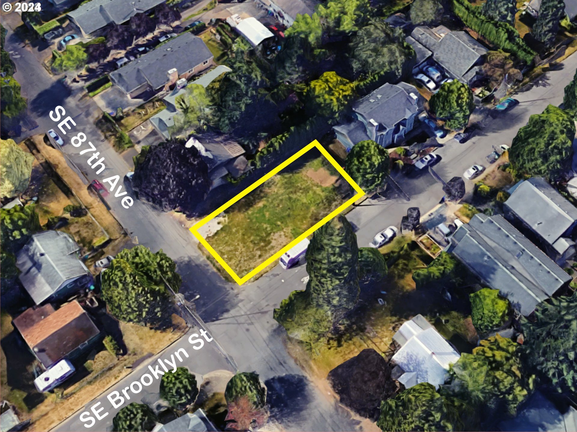 an aerial view of house with a yard and swimming pool