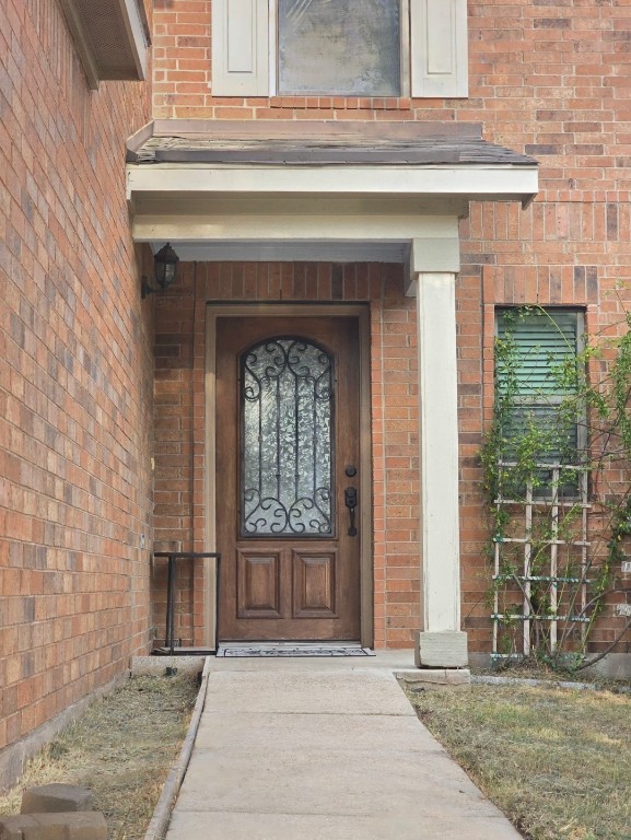 a front view of a house with a outdoor space