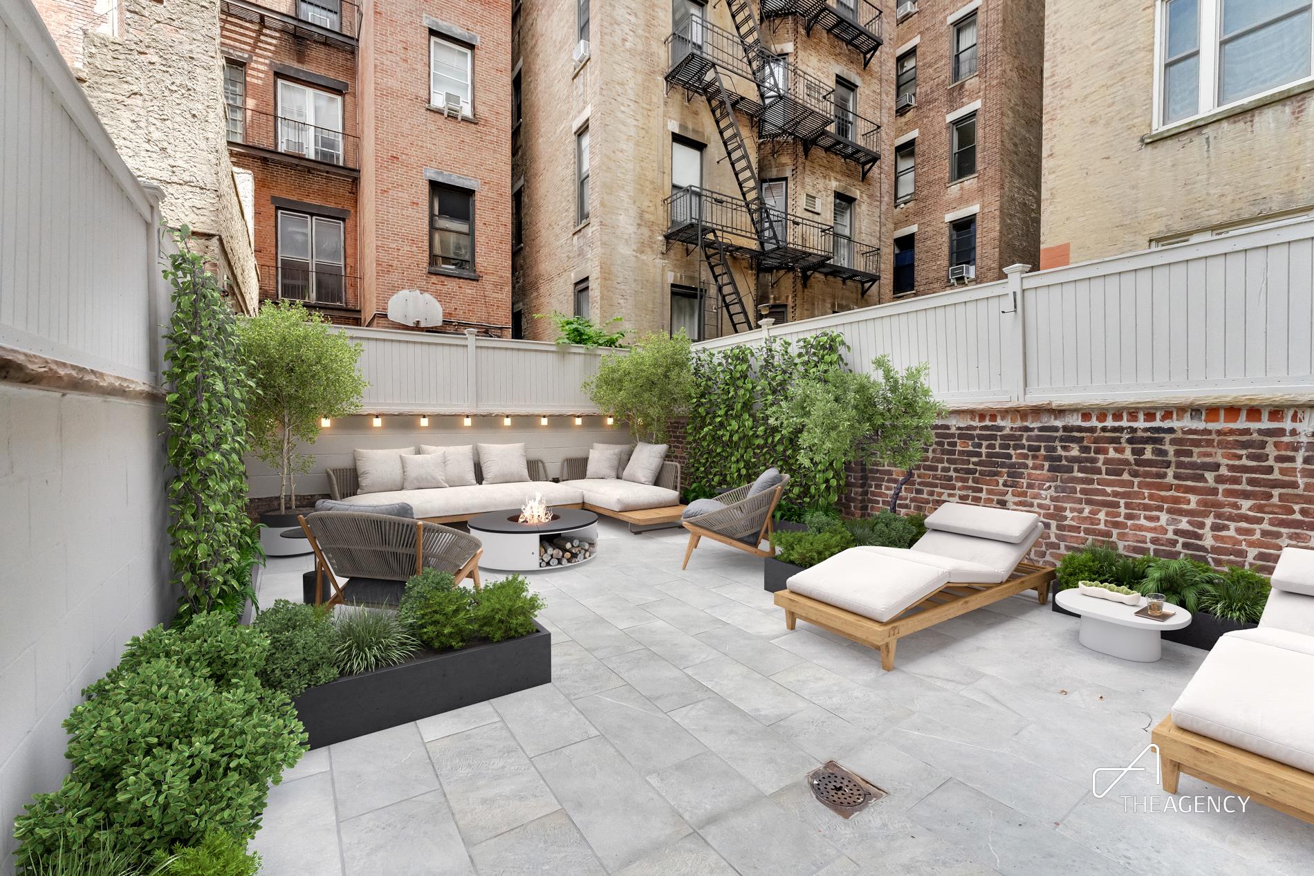 a view of a patio with couches and a potted plant