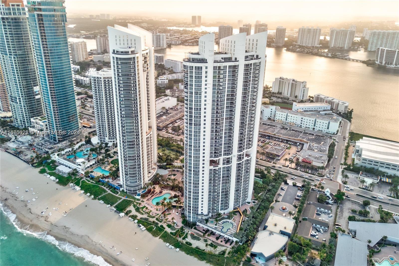 a view of a city with tall buildings