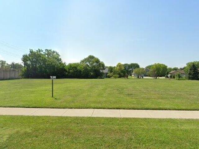 a view of a field with grass