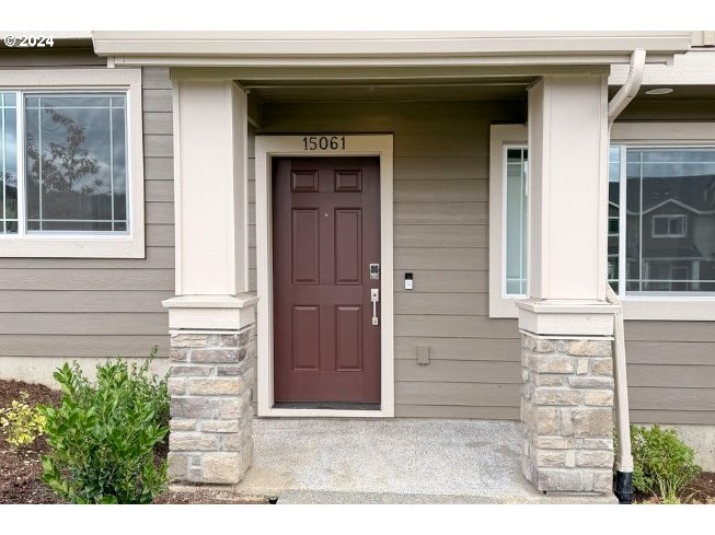 a front view of a house with a garage