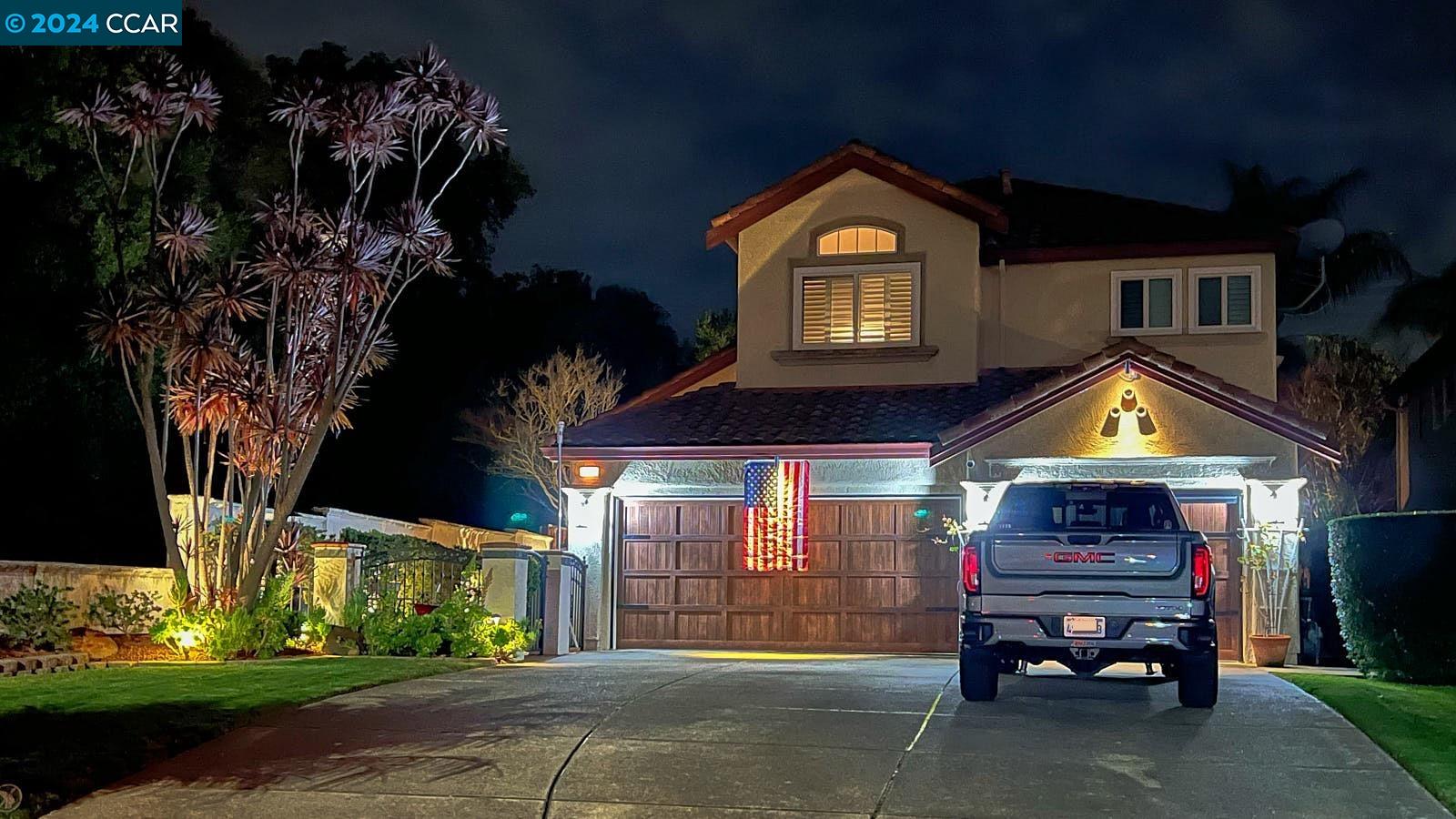 a car parked in front of a house