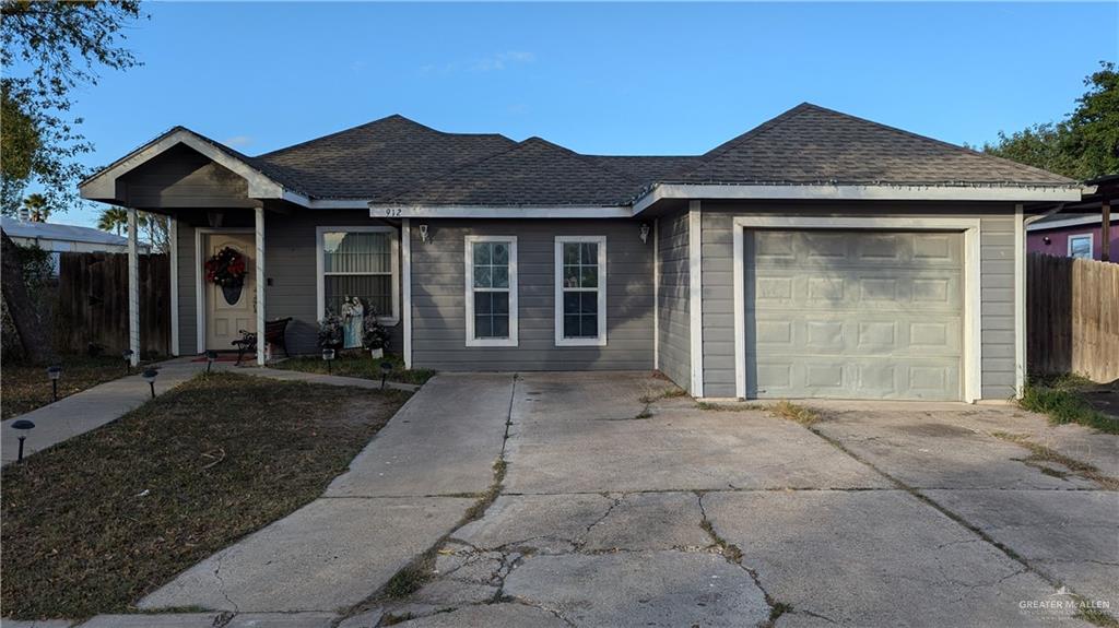 Single story home with a garage