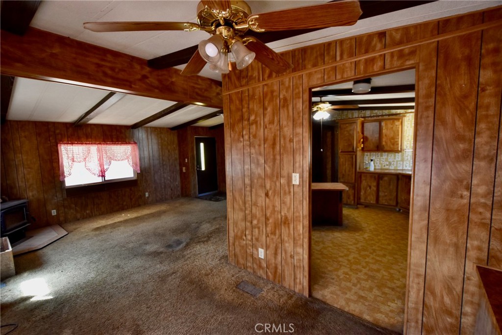 a view of an empty room with a bathroom