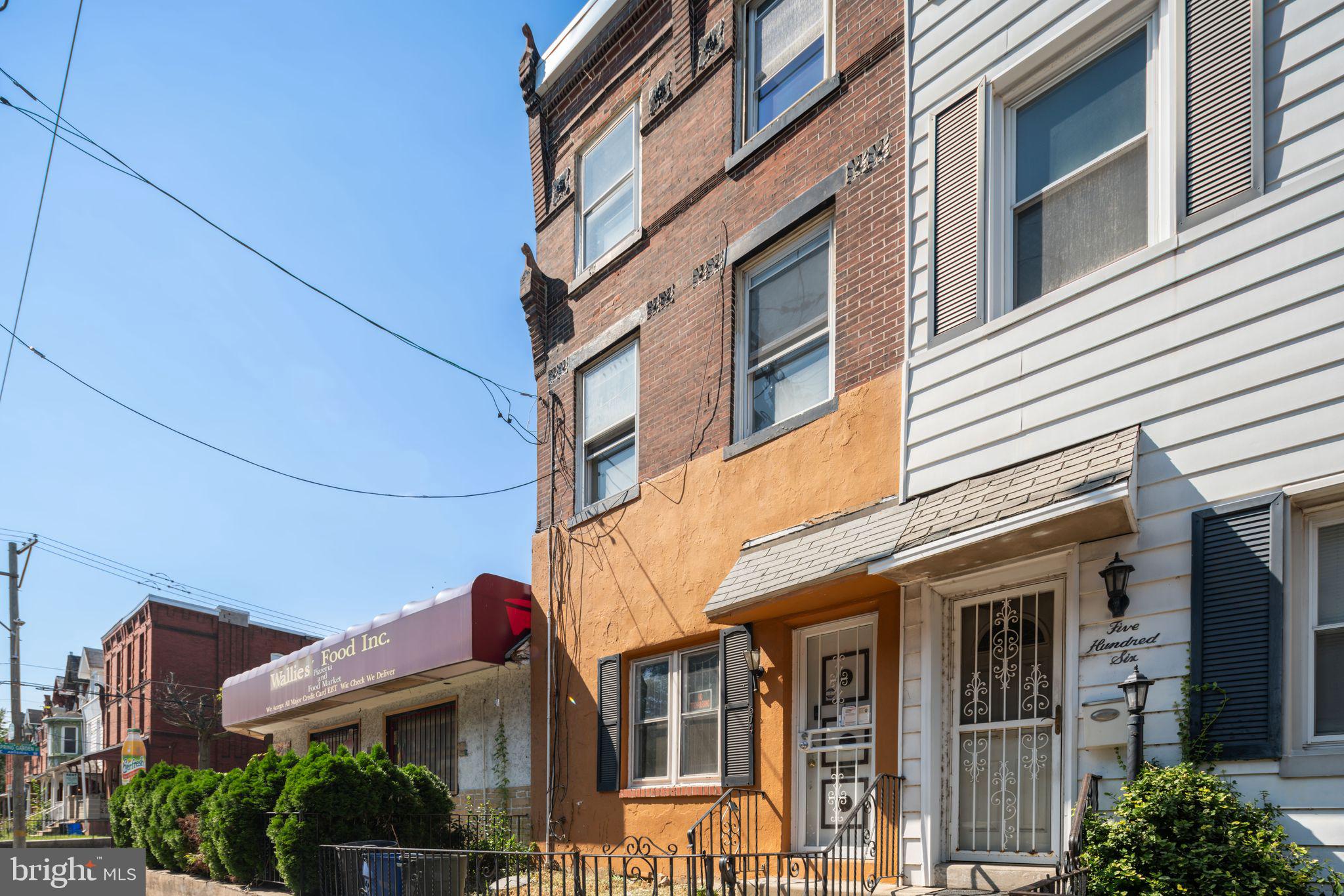 a view of a building with a porch