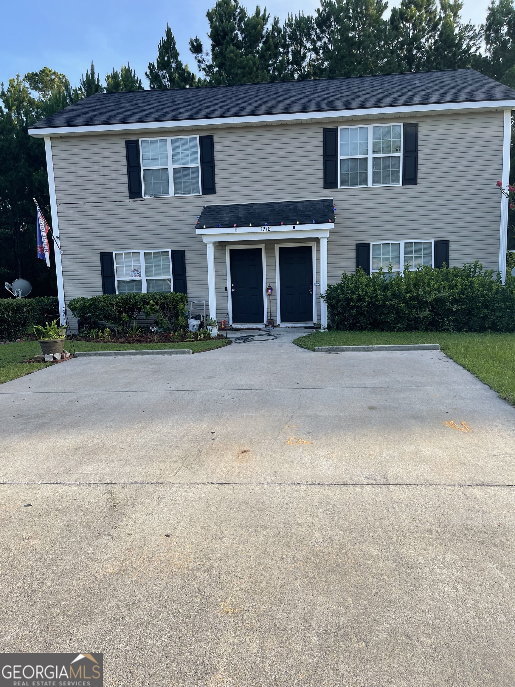 a front view of house with yard