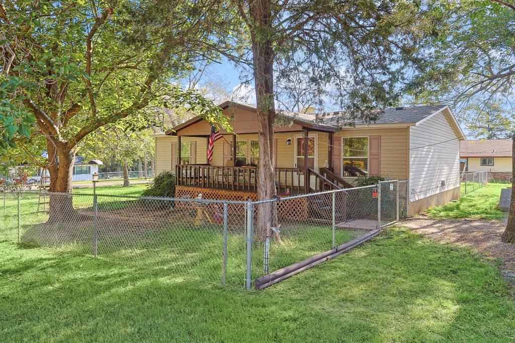 front view of house with a big yard