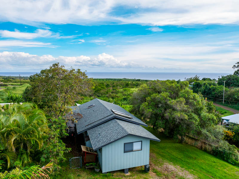 a house view with a garden space