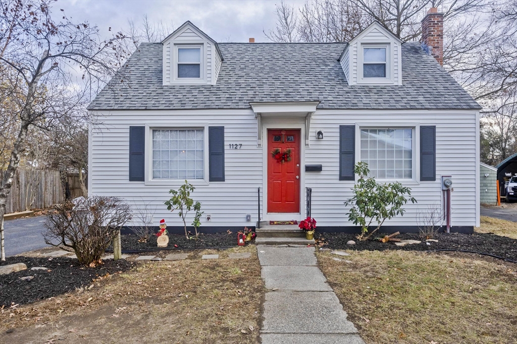 a front view of house with yard