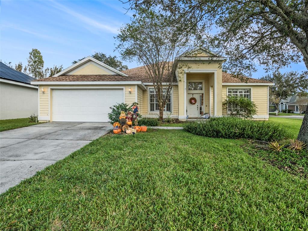 front view of a house with a yard