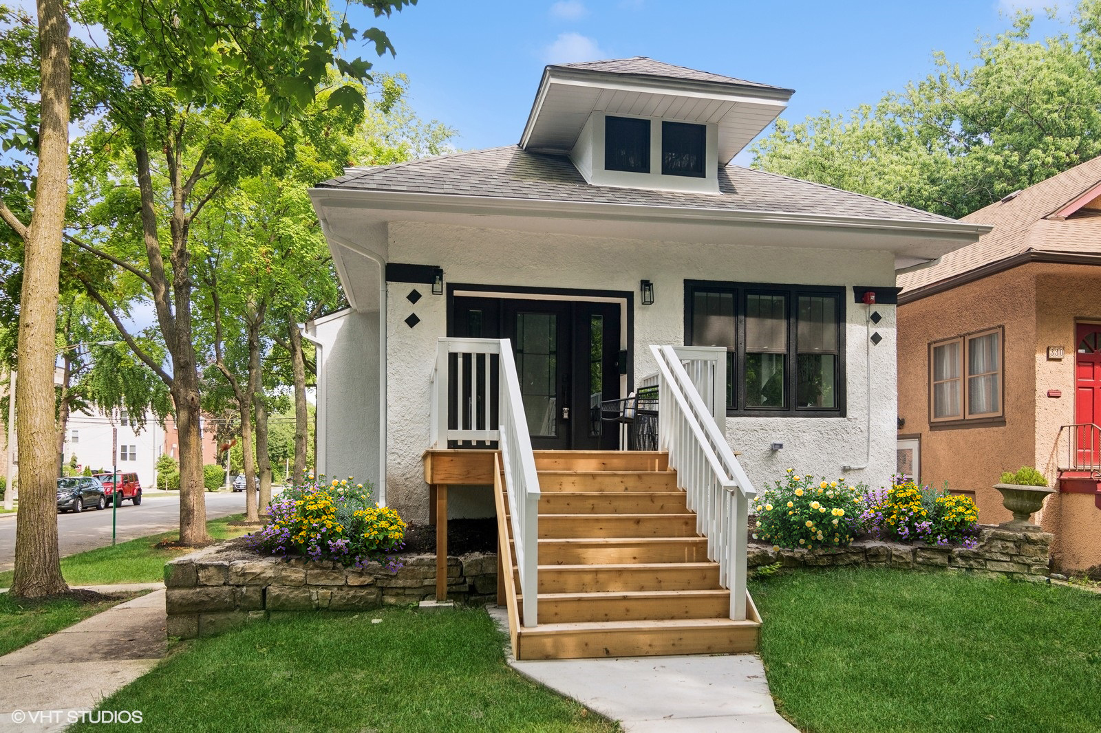 front view of a house with a yard